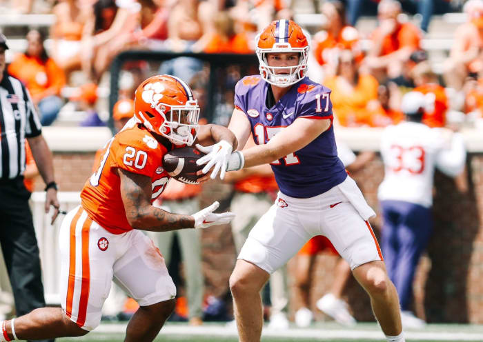 Christopher Vizzina hands the football off to Domonique Thomas during Clemson's Orange and White Game (Clemson Athletics)